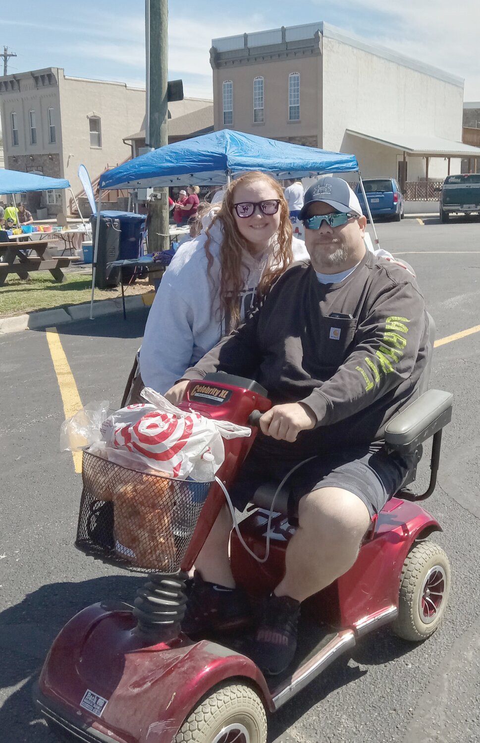 Officer Michael Bryson during the fundraising event. He returned home the day before from the hospital, one week after a drunk driver injured him in an accident.